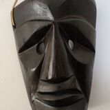 ethnic ebony mask to be laid or hung