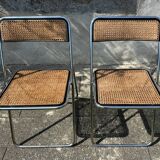 Pair of vintage metal caned folding chairs