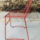 4 red design chairs