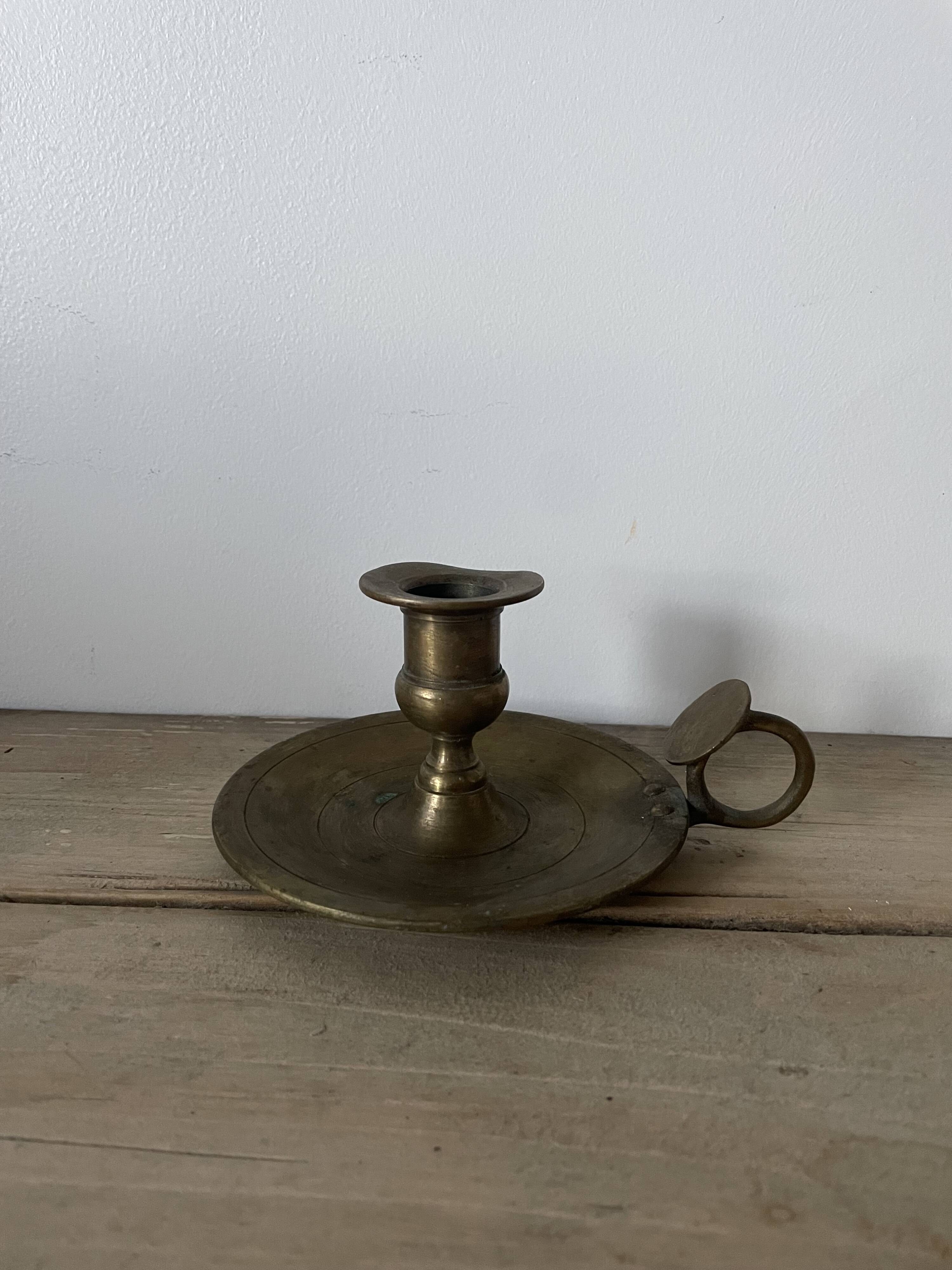 Old brass candle holder