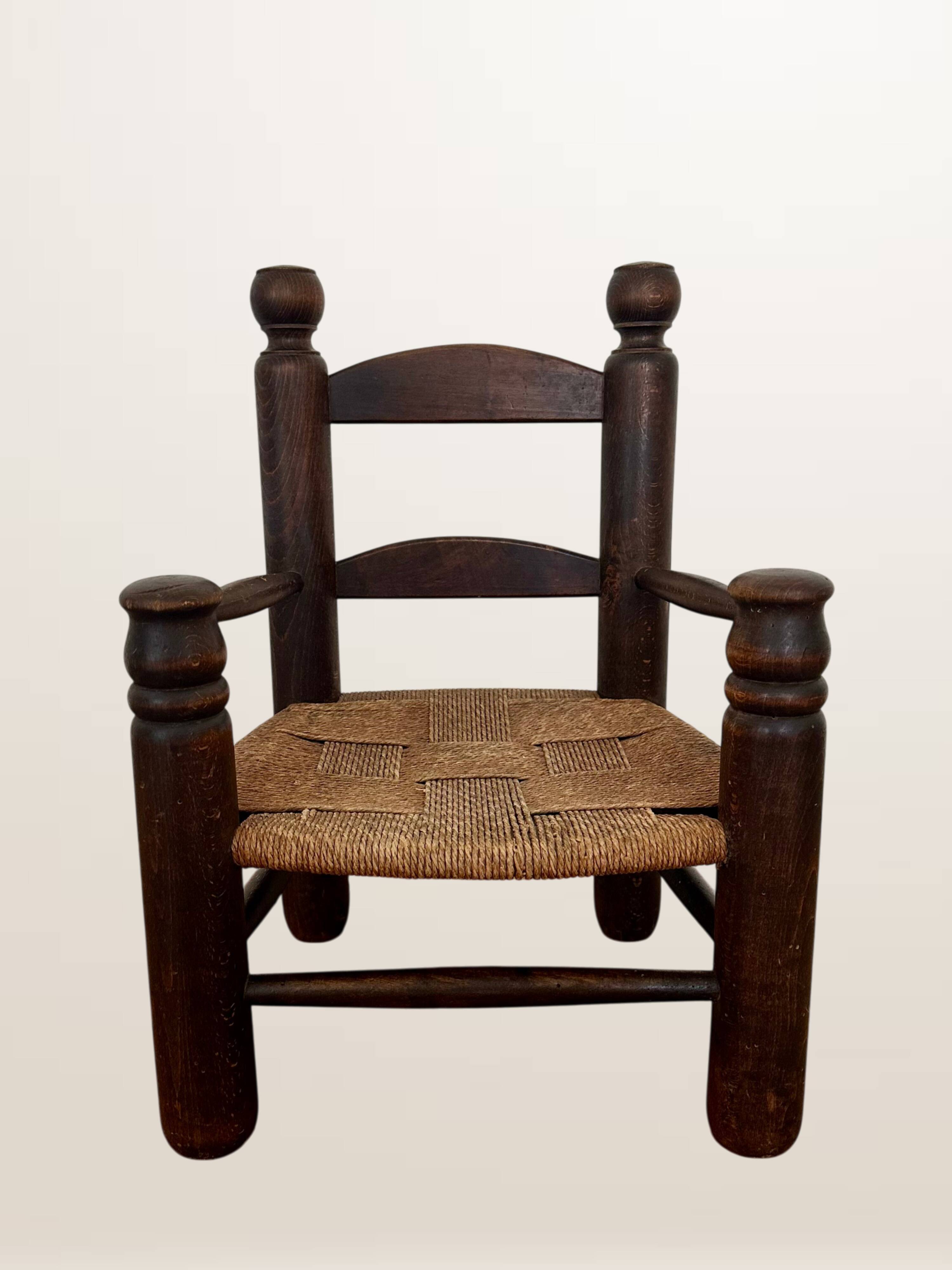 Child's armchair in the style of Charles Dudouyt.