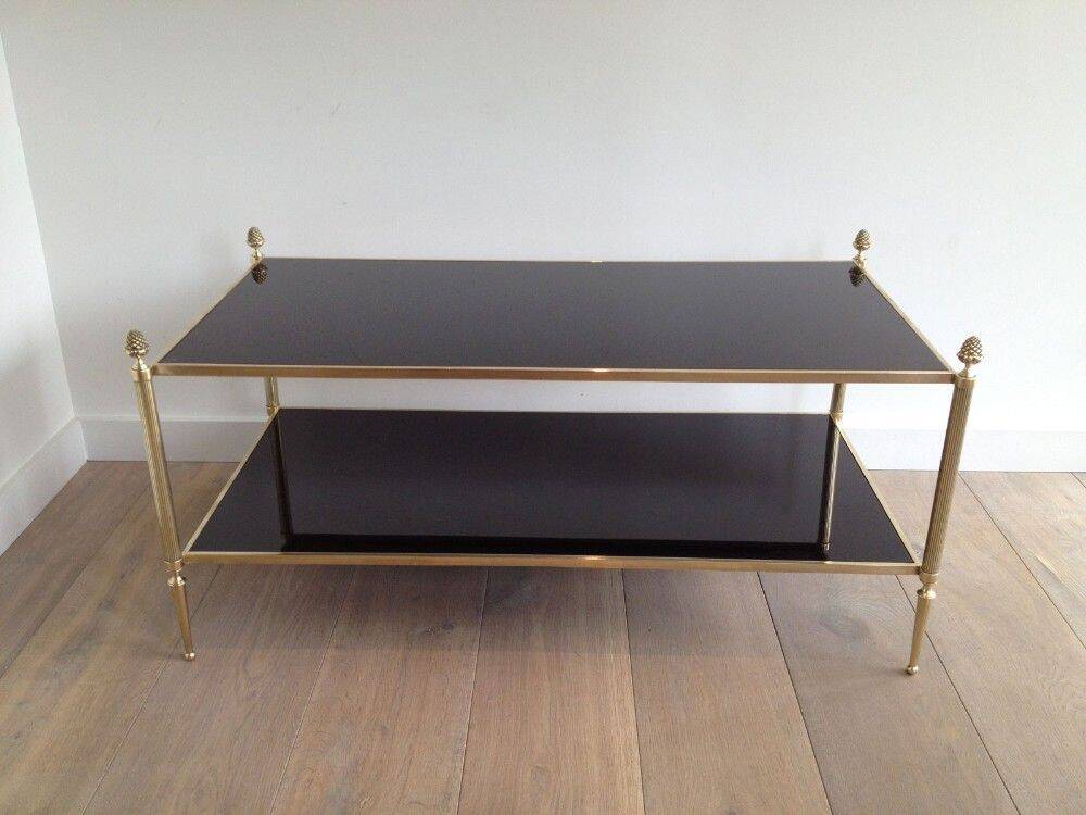 Neoclassical style coffee table in bronze and brass with double black lacquered glass tops from Maison Baguès