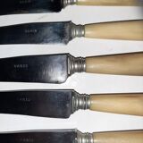 29-piece horn cutlery set, knives and serving utensils.