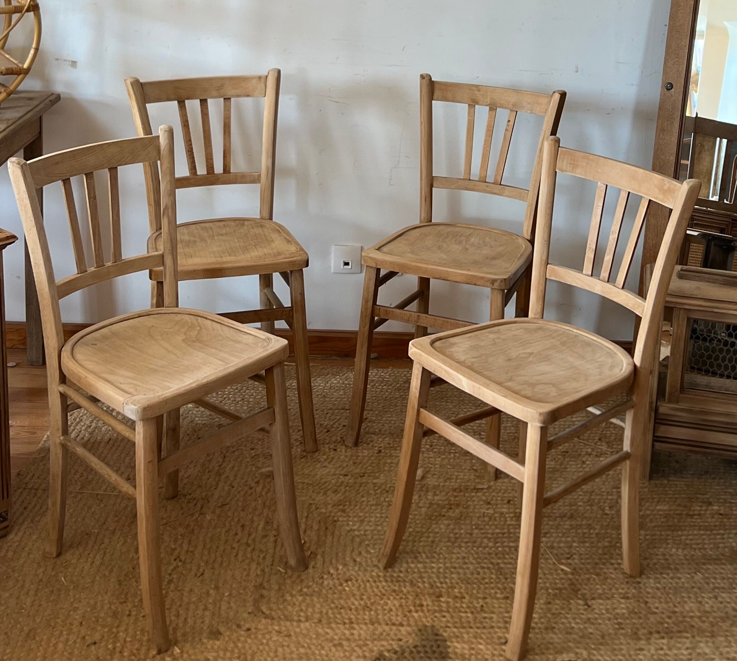 Set of 4 vintage bistro chairs in raw wood.