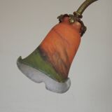 Art Nouveau three-light chandelier in bronze with orange and green glass shade, France.