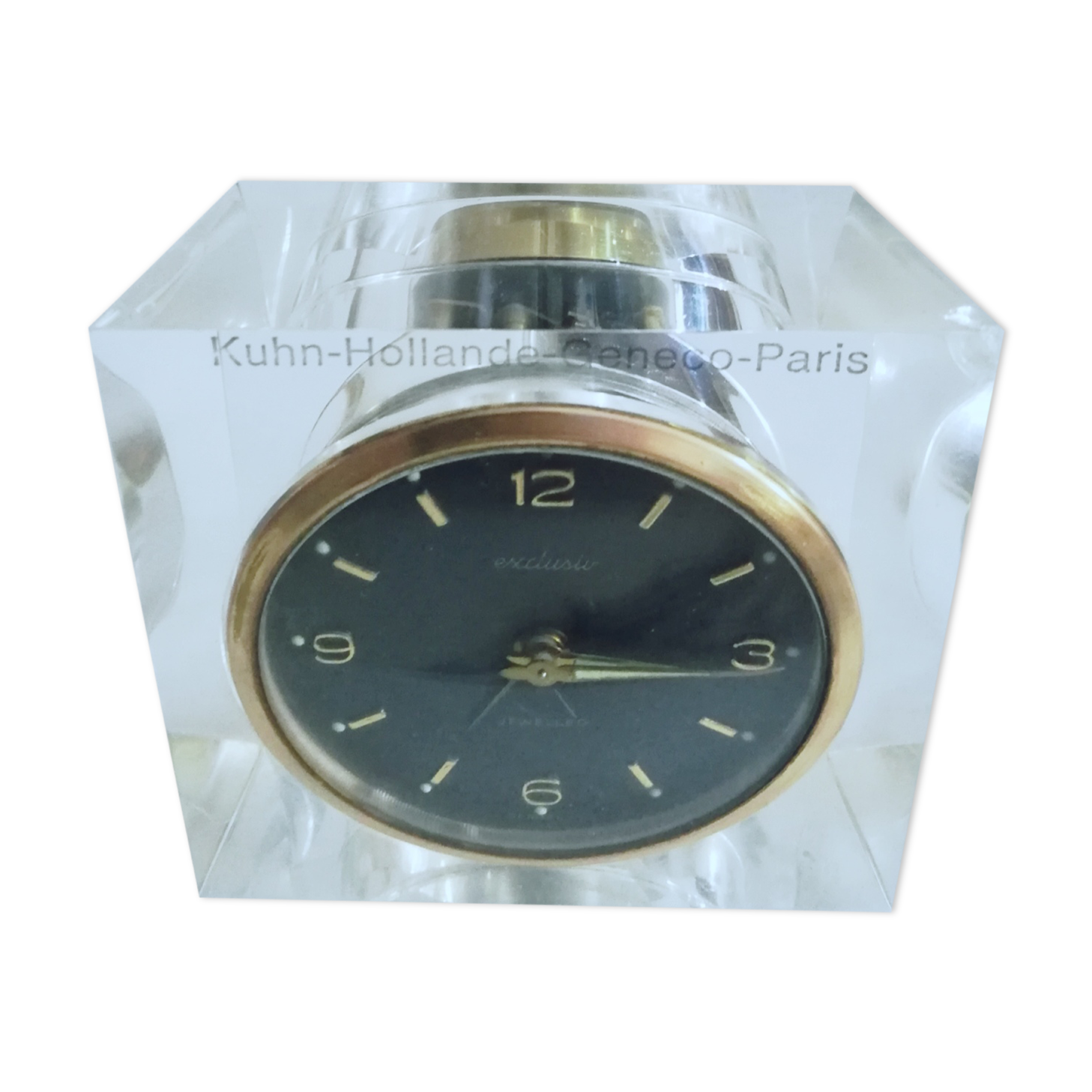 Alarm clock with exposed mechanism in plexiglass and brass