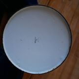 White enamelled metal broc