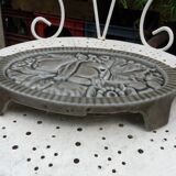 Art Deco period grey enamelled cast iron trivet