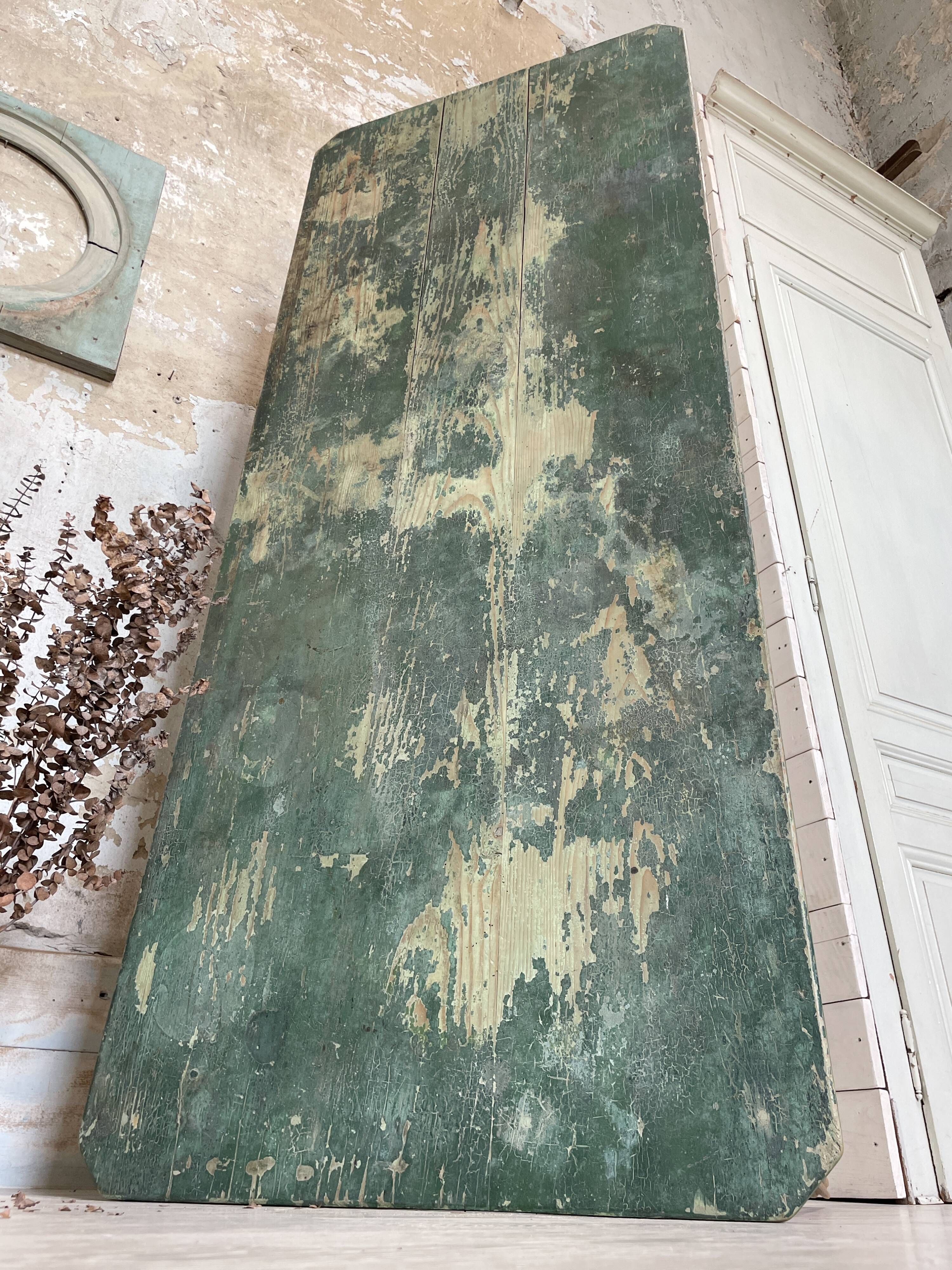 Vintage farm table with spindle legs.