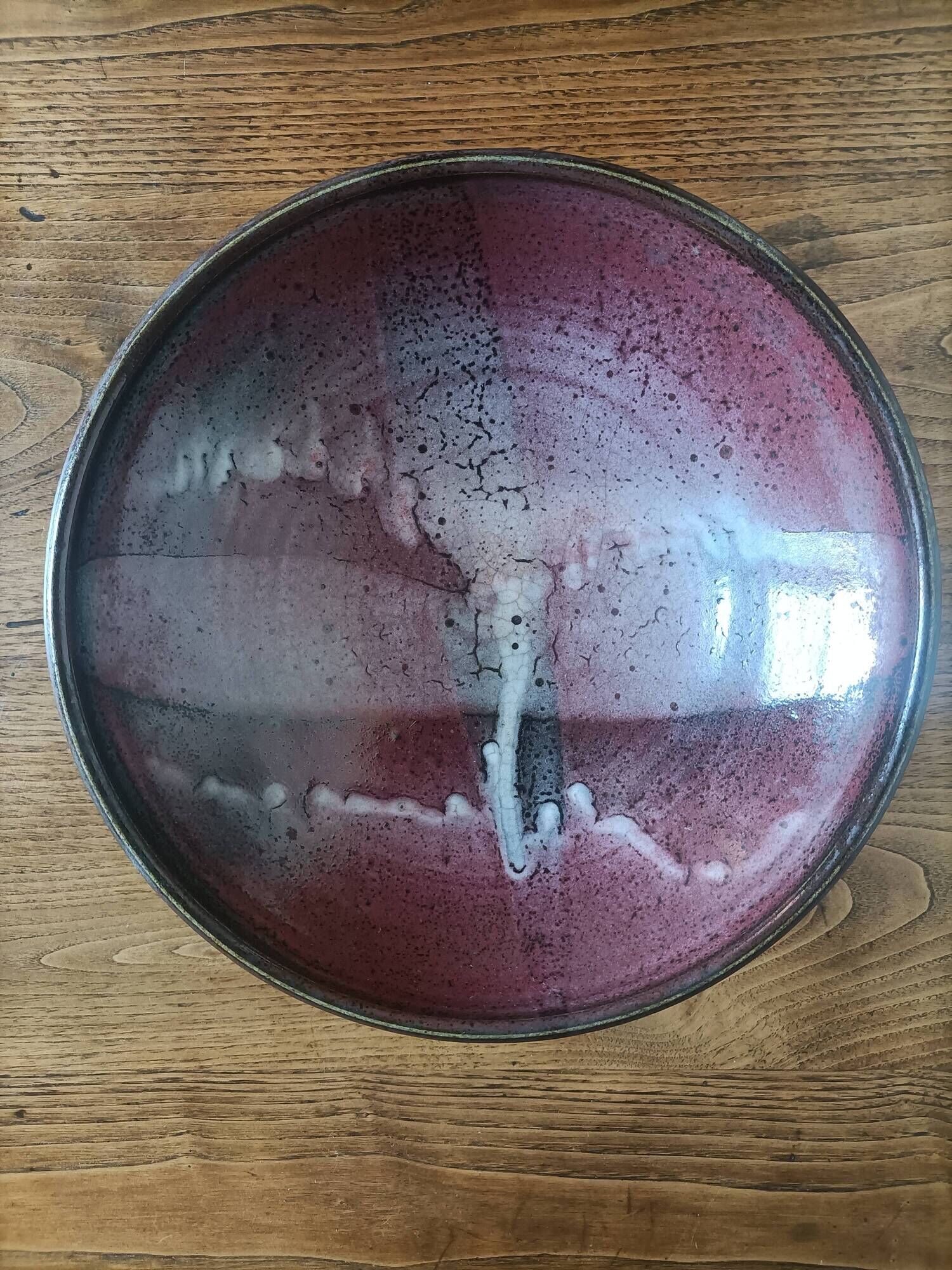 Signed ceramic fruit bowl on foot