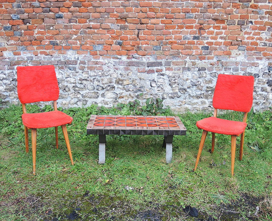 2 old red 'moumoute' chairs