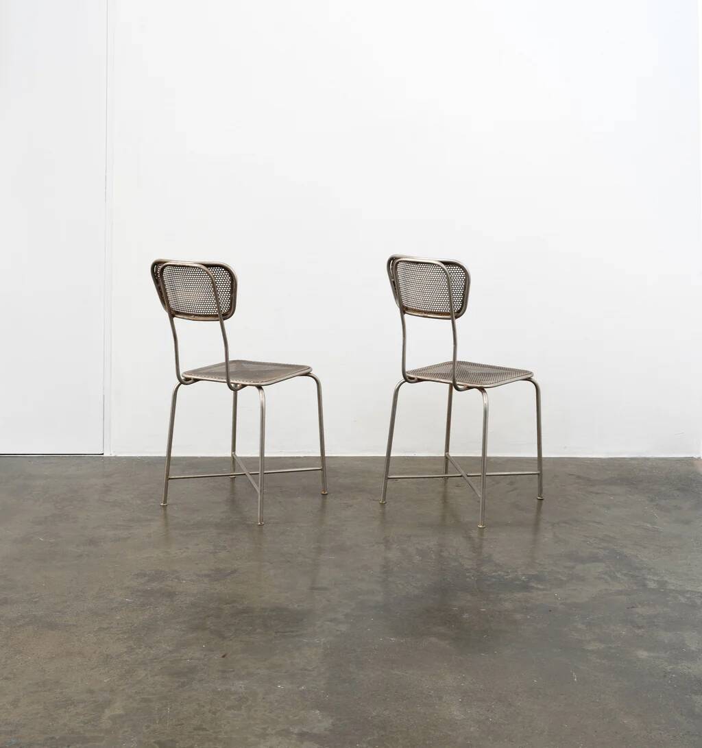 Vintage perforated metal chairs