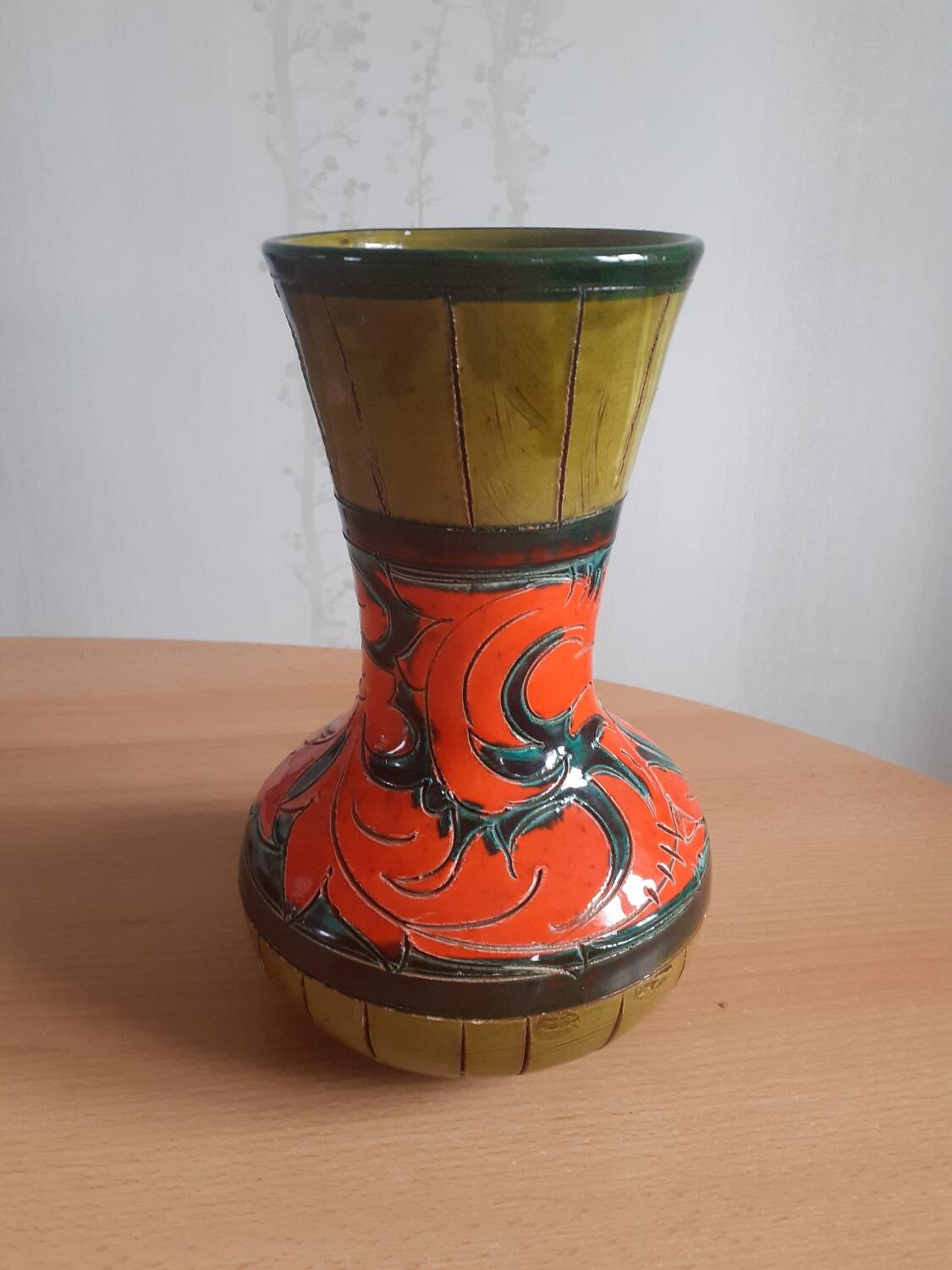 Orange and green ceramic vase