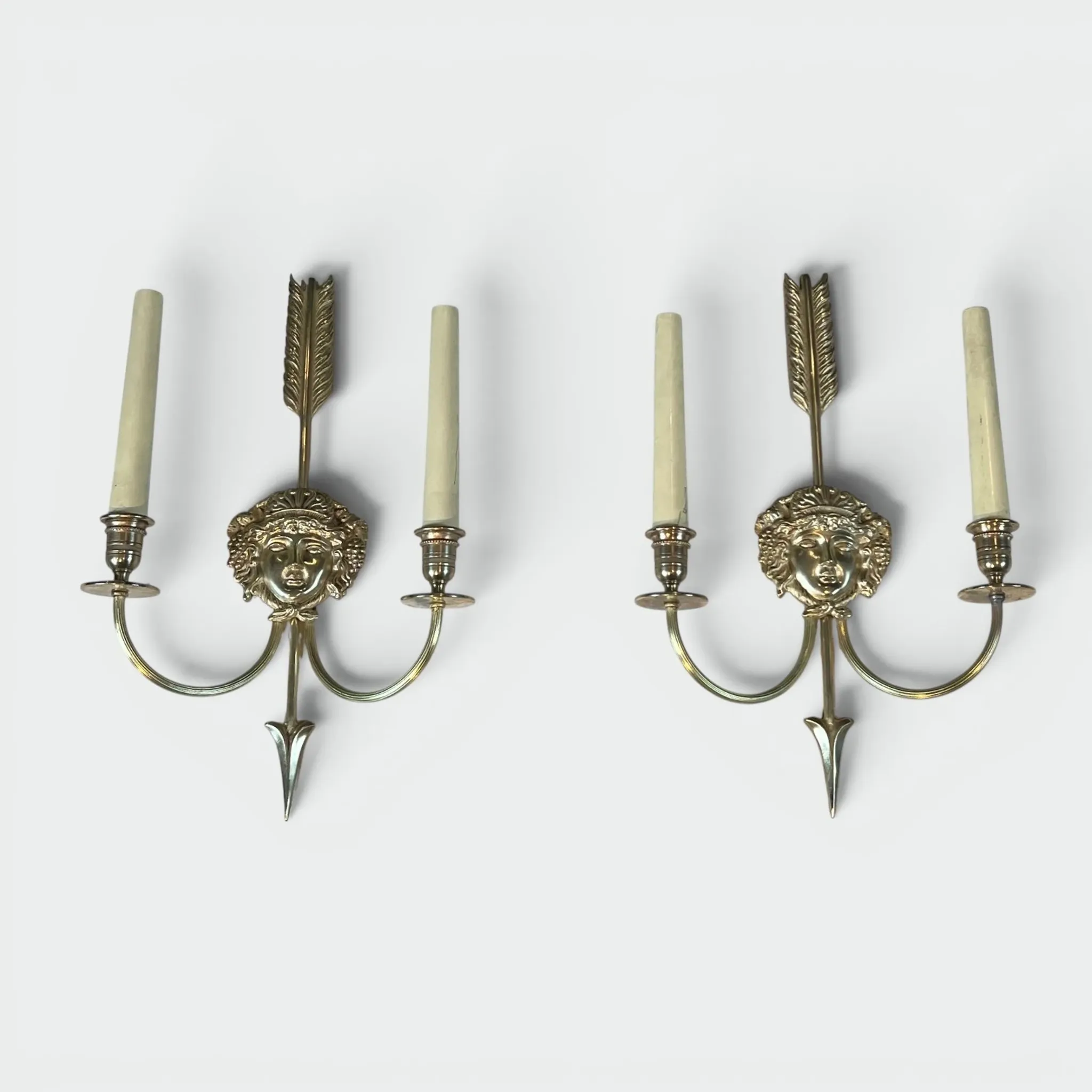 Pair of Two-Arm Bronze Wall Lights with Arrow and Mask Decoration