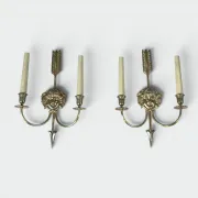Pair of Two-Arm Bronze Wall Lights with Arrow and Mask Decoration