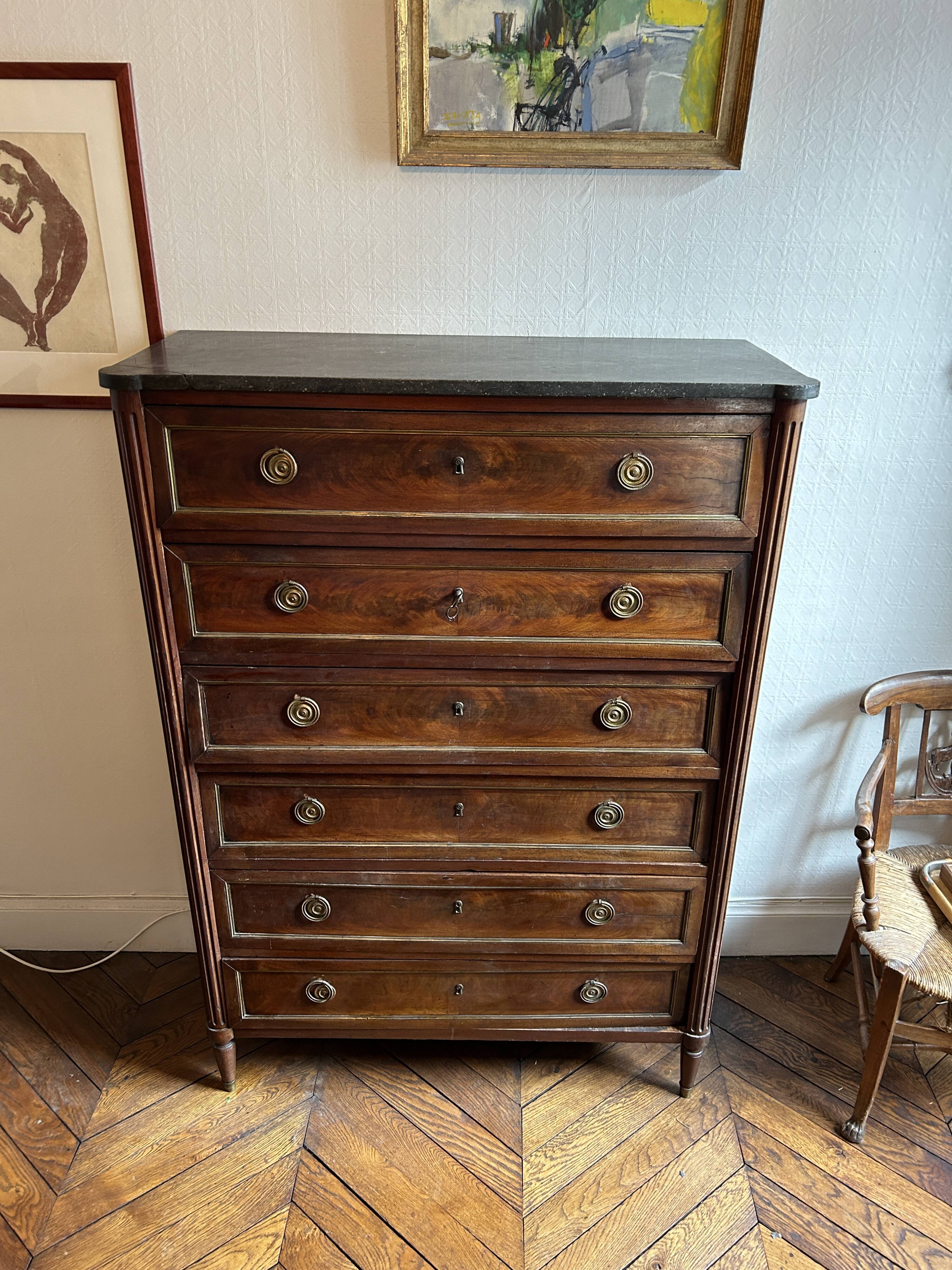 Mahogany and black marble chest of drawers, late 18th-early 19th century