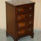 Paire de commodes françaises en bois dur flammé poli