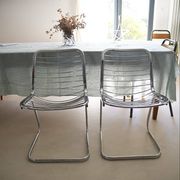 Lot of 2 chrome metal chairs by Gastone Rinaldi.