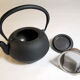 Black cast iron teapot