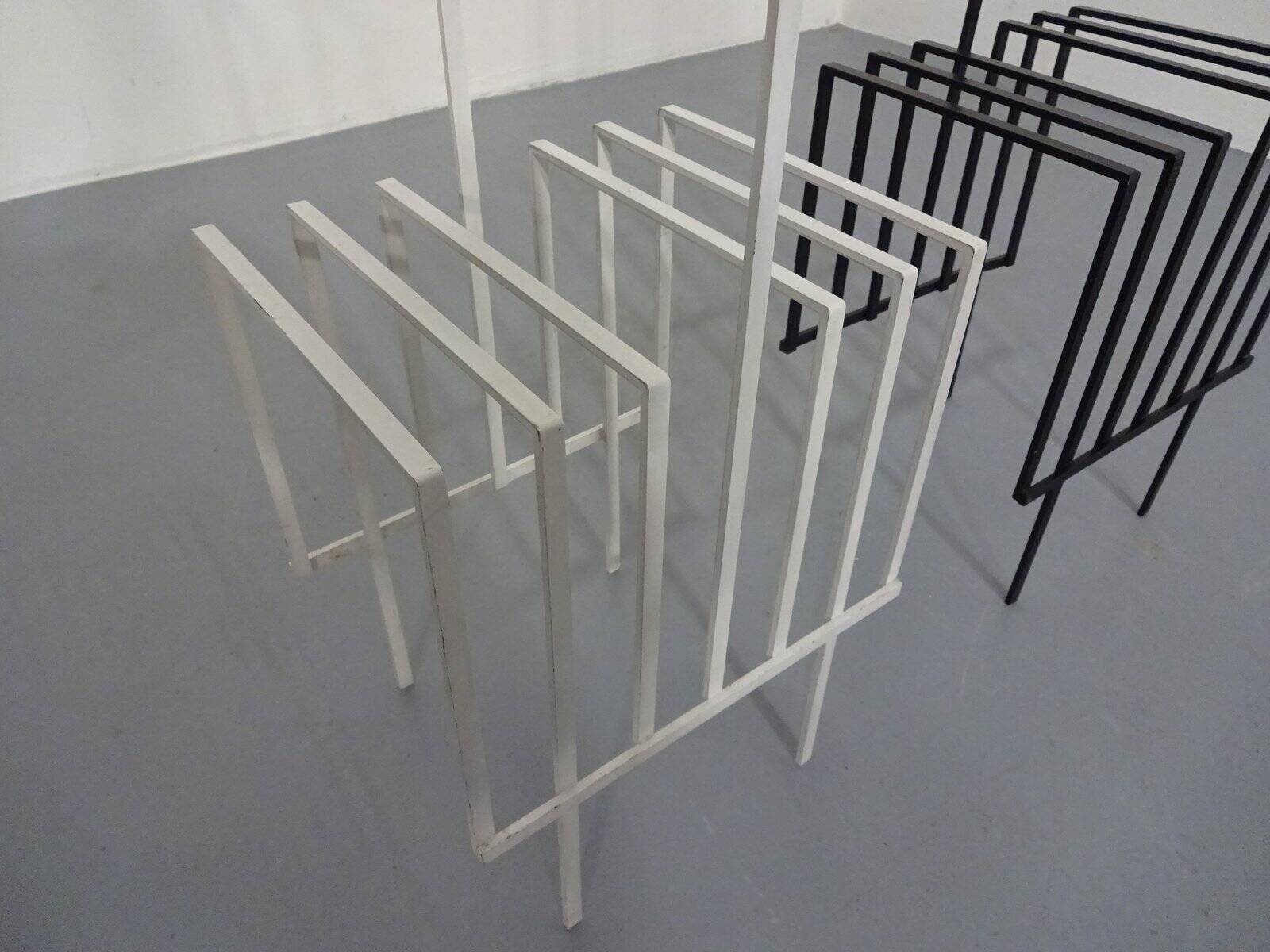 Steel magazine or record racks, 1960s, set of 2
