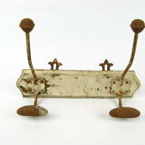 Double patere with "fleur de lys" support
