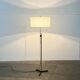 Mid-century German minimalist tripod floor lamp from the 1960s.