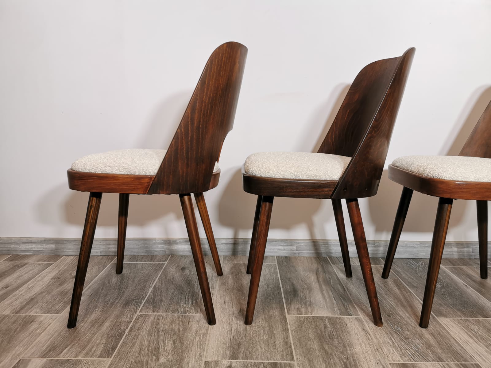 Dining chairs by Oswald Haerdtl