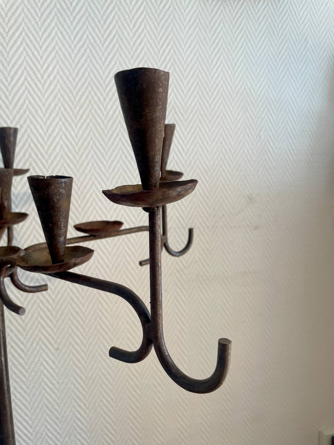 Large standing candlestick in folk art forged metal