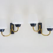 Pair of vintage Maison Arlus wall lights from the 1950s in brass, glass globe.