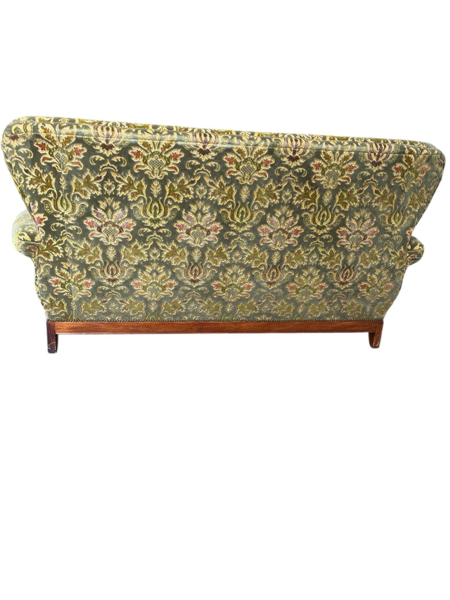 Vintage baroque chair with a rich floral pattern