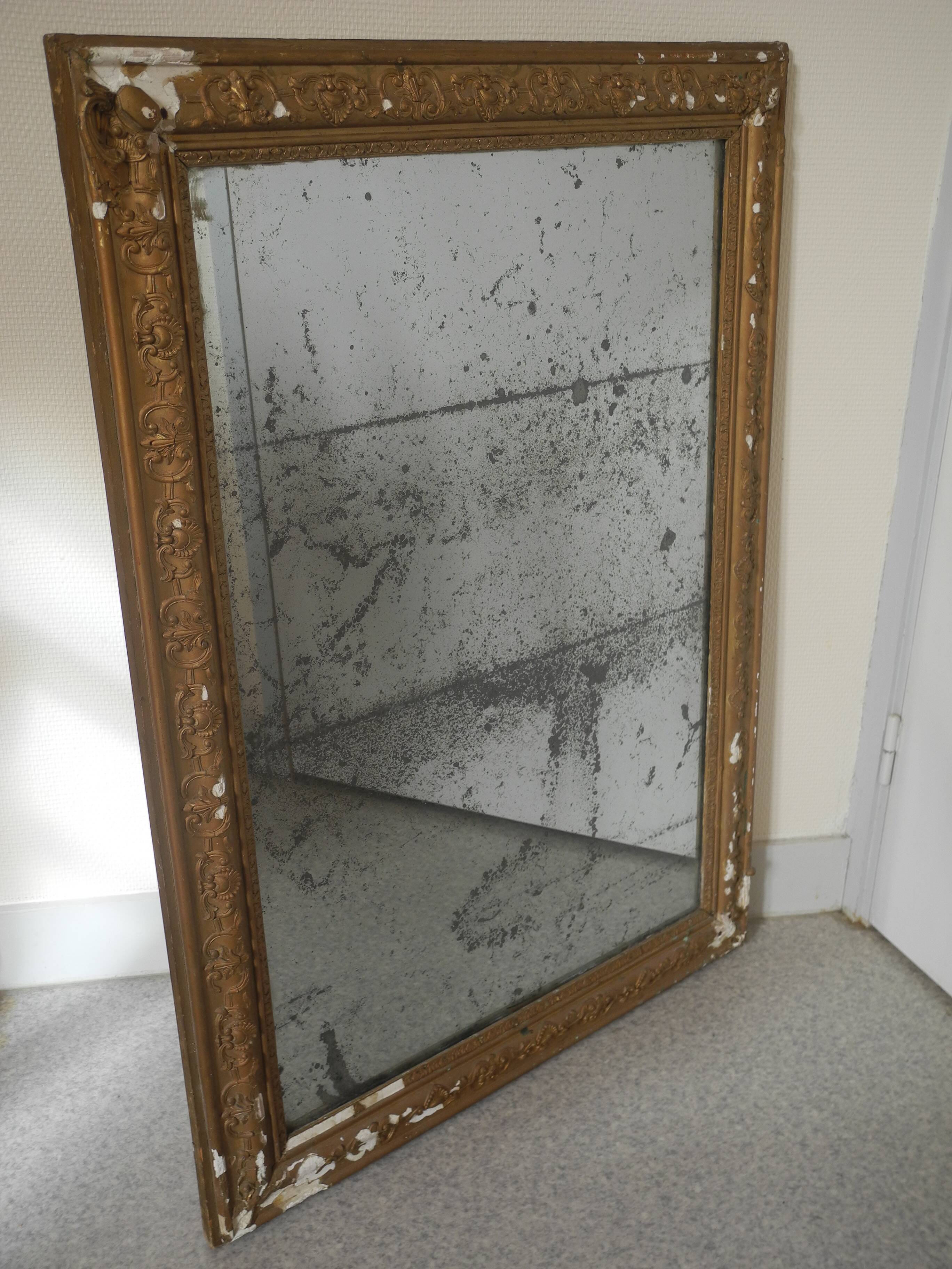 antique mercury mirror with gilded wood and stucco from the 19th century