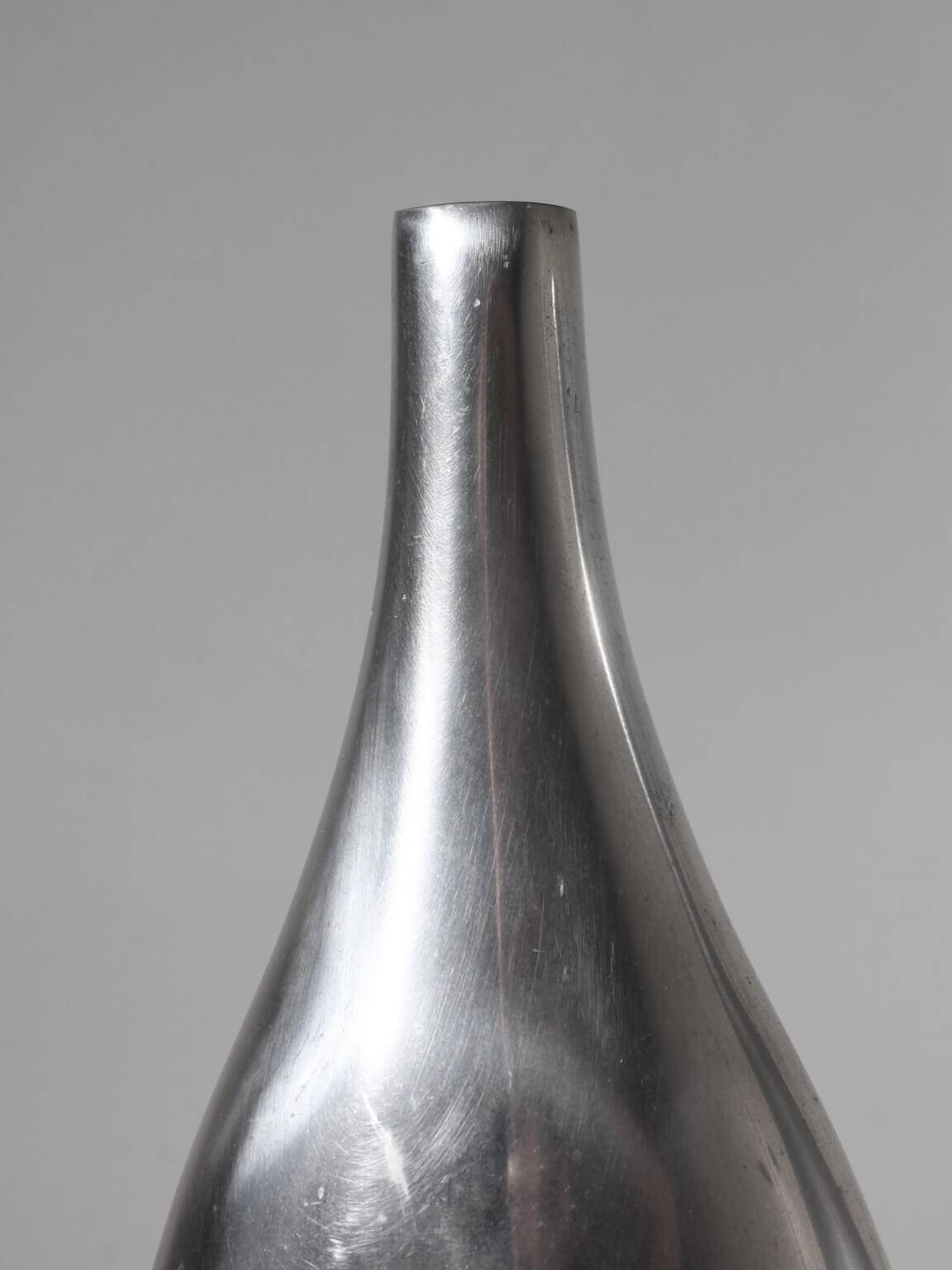 Pair Of Polished Aluminum Tall Vases