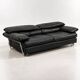 Two-seater black leather sofa from Roche Bobois with a chrome frame.