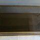 Smoked low years 70 brass and glass table