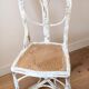 Pair of vintage restaurant chairs in rattan