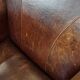Fauteuil design en cuir de mouton aux finitions soignées et soignées