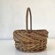 Round wicker and wood basket