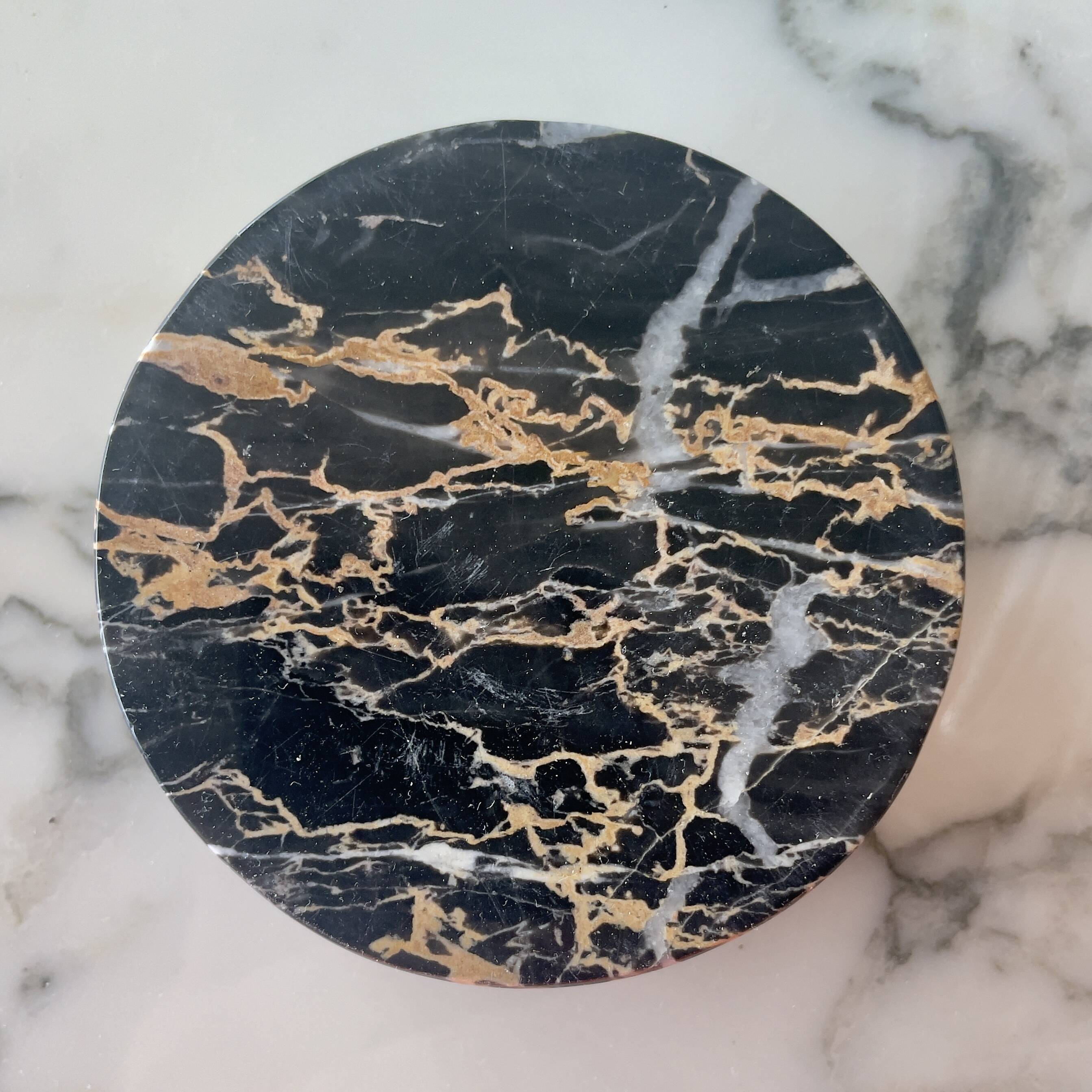 Marble pocket emptier