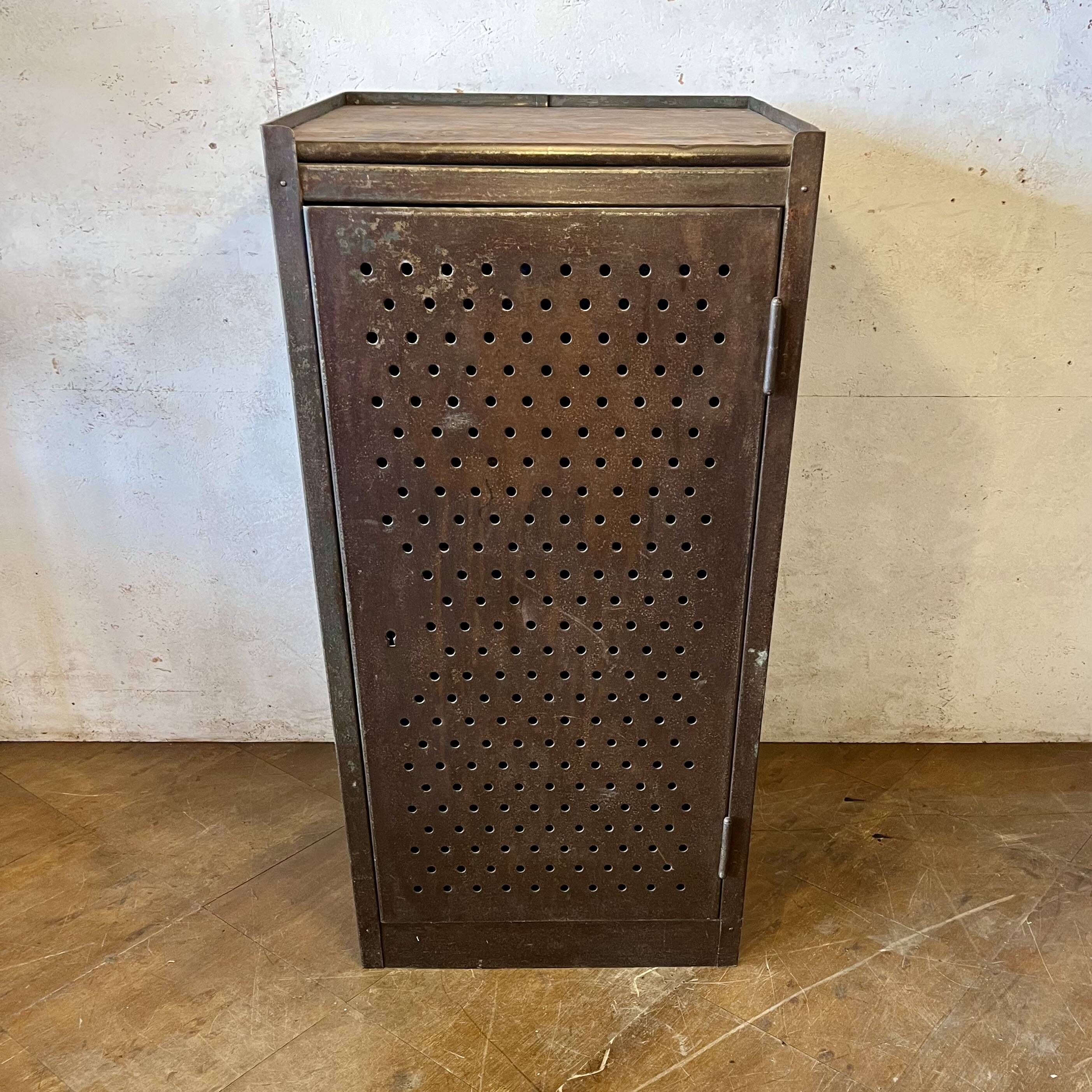 Small industrial storage unit in perforated metal – Early 20th century -