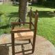 Small wooden and vintage straw children's chair Varnished wood and woven straw