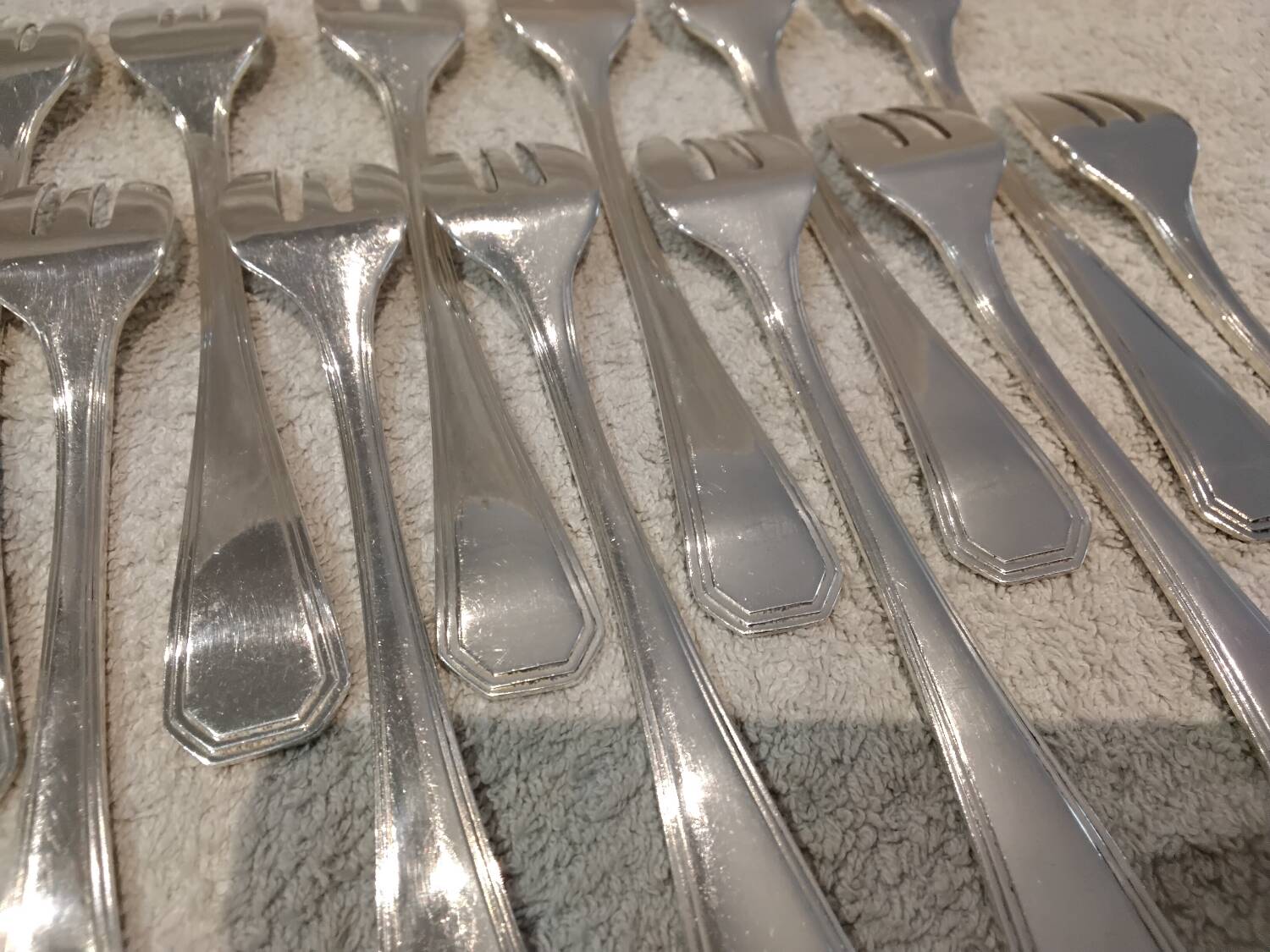 12 silver-plated oyster forks by Christofle America