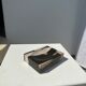 Symmetrical multicolored petrified wood soap dish