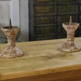 Pair of patinated cast iron candlesticks, 1940s
