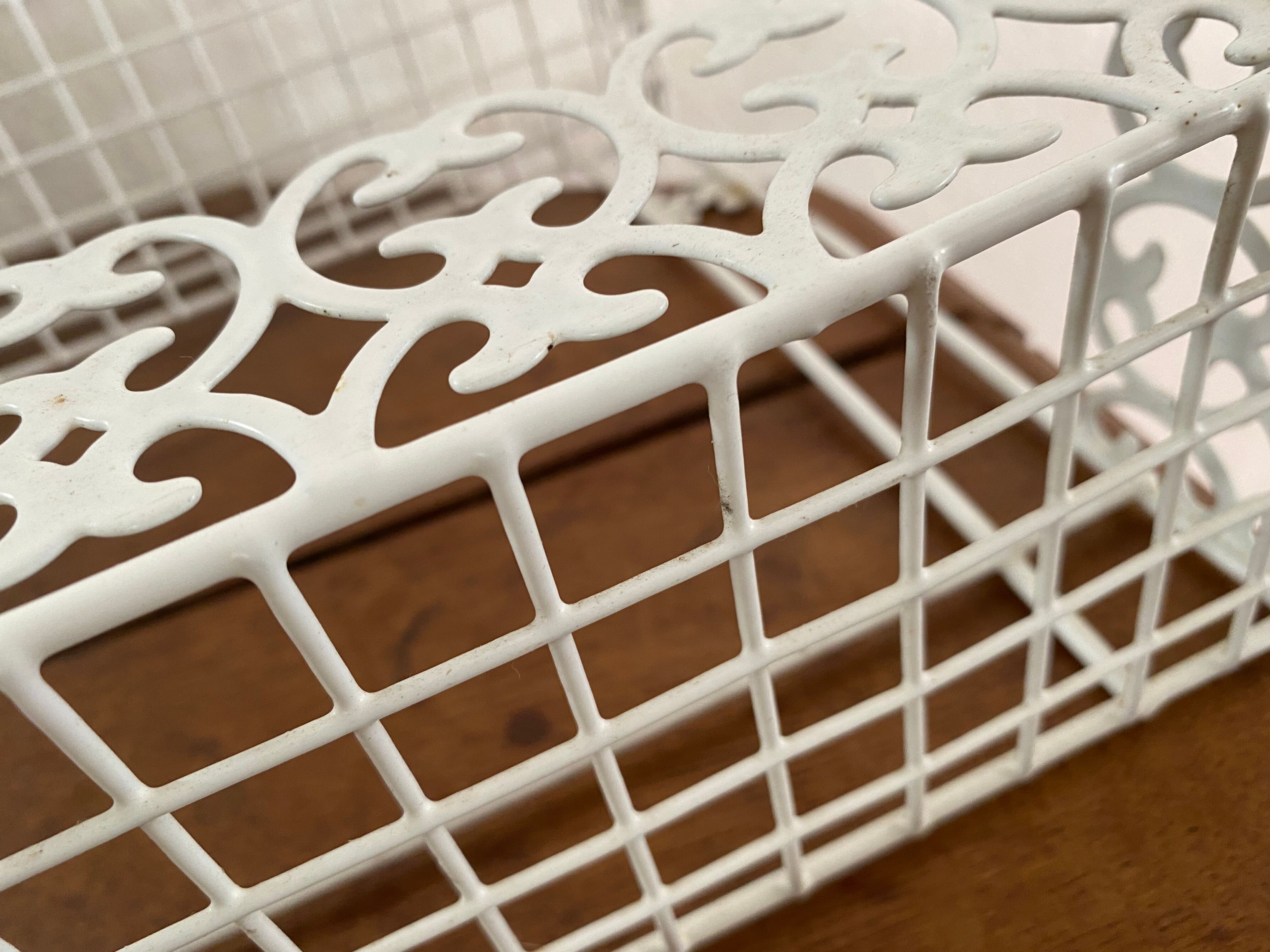 Openwork metal shelf