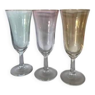 3 iridescent colored champagne glasses