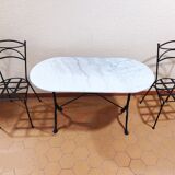 Oval carrara marble table (fixed) and two cast iron chairs