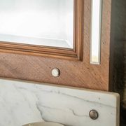 Antique washbasin cabinet from 1928 in wood and marble with illuminating mirror.