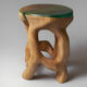 Tabouret sculpté unique à partir d'une seule pièce de bois