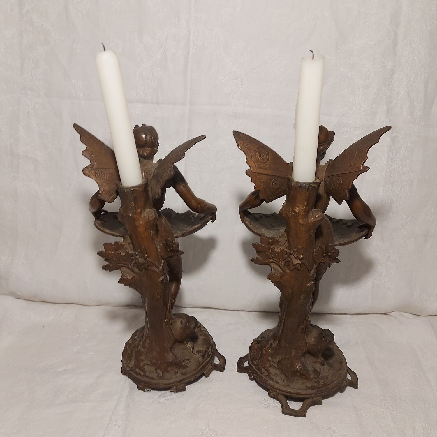 Pair of art nouveau candle holders in regulates