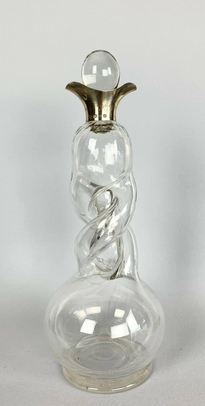 Blown glass carafe with silver frame